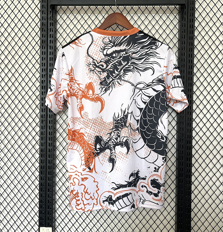 Maillot Real Madrid Dragon Orange 2025 2026