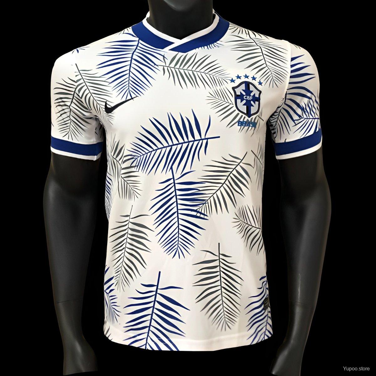 Maillot Brésil 2025 (version joueur) – Motif feuilles de palmier blanc