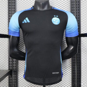 Maillot noir à manches bleues, version joueur de l'Algérie, 2025