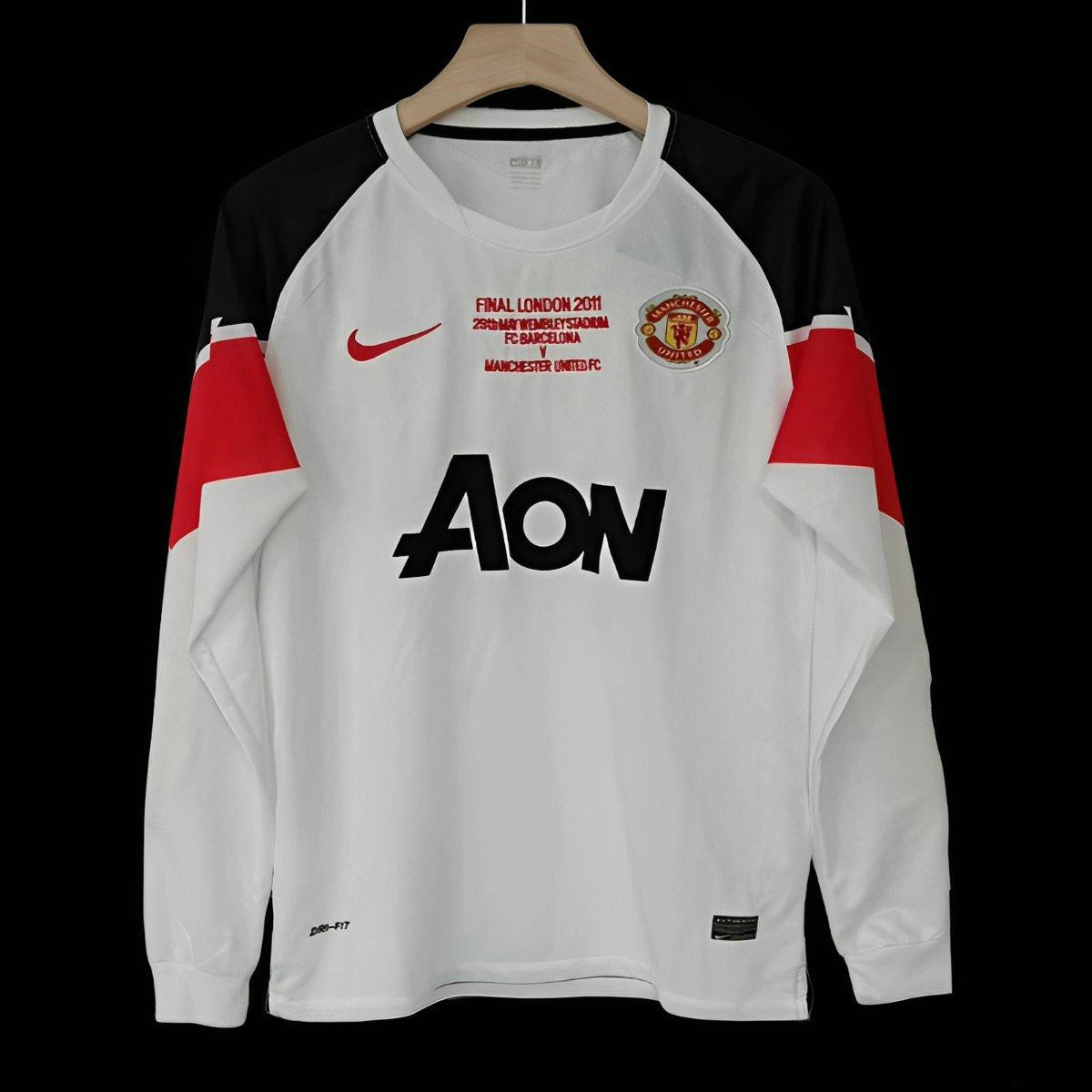 Maillot-vintage-Manchester-United-2010-2011-exterieur-manches-longues-1.jpg Maillot de foot vintage Manchester United 2010/2011 - Exterieur Manches Longues